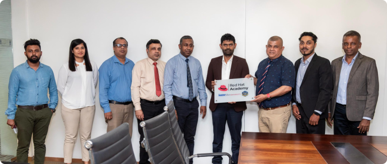 NIBM Certification Hub representatives showcasing a Red Hat Academy partnership certificate for IT certification training in Sri Lanka